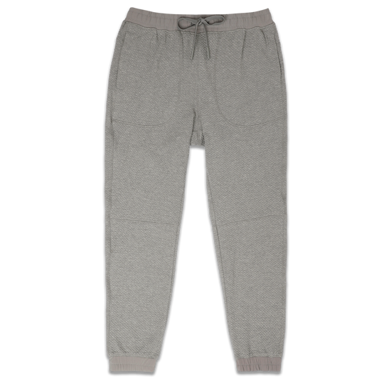 Roam Jogger Heather Grey front with an elastic waistband, two side seam pockets, dyed to match drawstring, and ribbed ankle cuffs